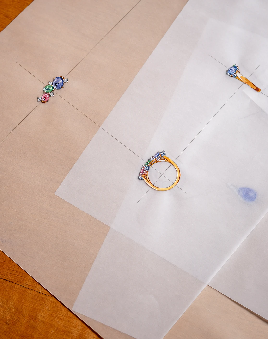 Rings and jewels displayed on light-coloured paper