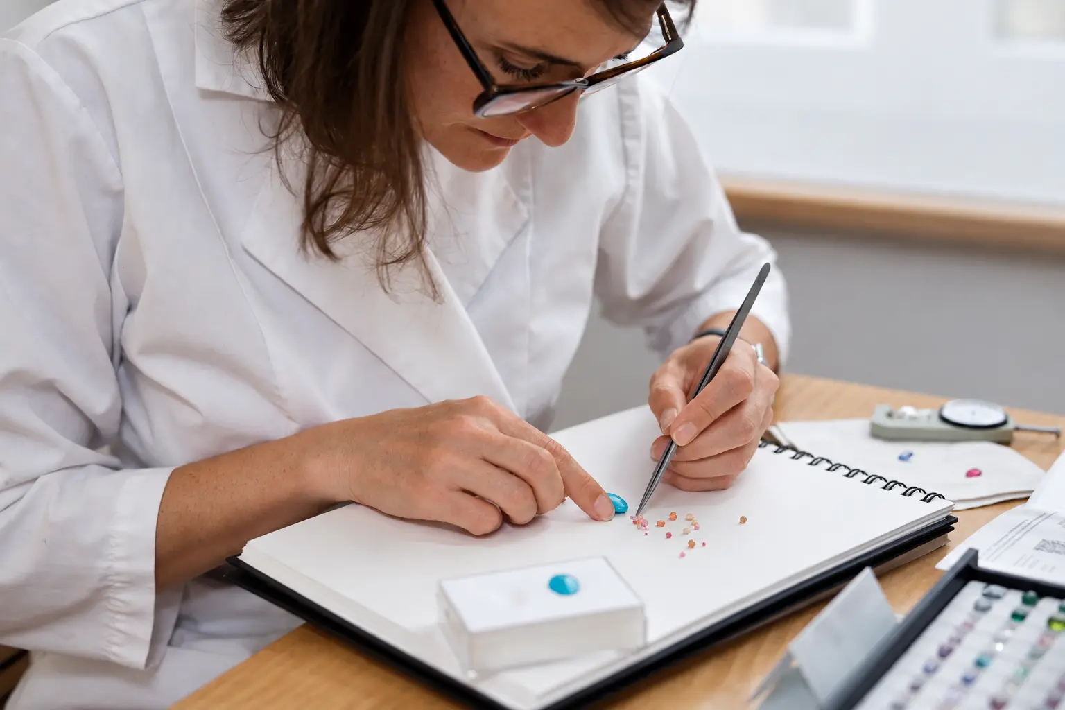 Aurore Guiot creating at her bench